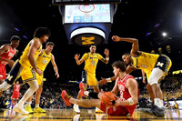 Elliot Cadeau (3), Will Tschetter (42), Yaxel Lendeborg (23), and Nimari Burnett (4)