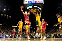Aday Mara (15), Trey McKenney (1), and Morez Johnson Jr. (21)