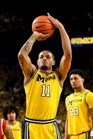 Elliot Cadeau (3), Roddy Gayle Jr. (11), and Yaxel Lendeborg (23)