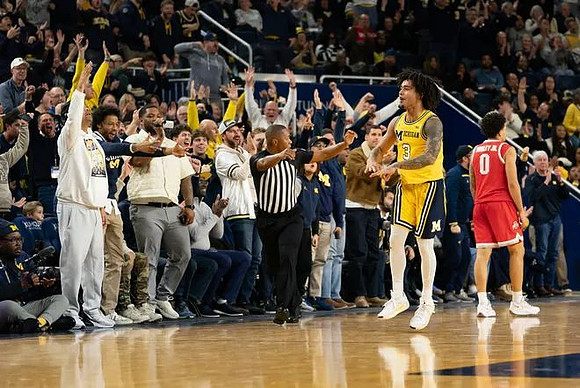 Trey Burke and Elliot Cadeau (3)