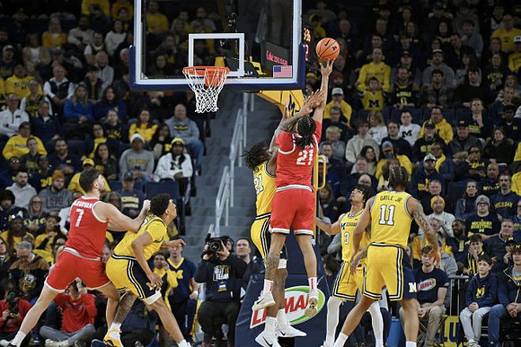 Yaxel Lendeborg (23), Morez Johnson Jr. (21), Elliot Cadeau (3), and Roddy Gayle Jr. (11)