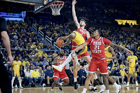 L.J. Cason (2), Elliot Cadeau (3), Morez Johnson Jr. (21), and Yaxel Lendeborg (23)
