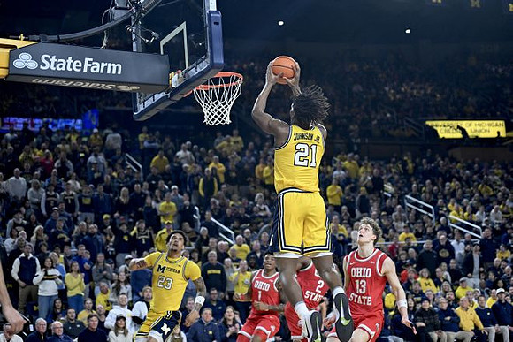 Yaxel Lendeborg (23) and Morez Johnson Jr. (21)