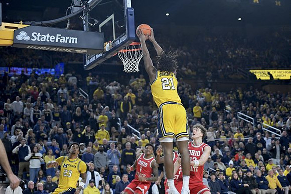 Yaxel Lendeborg (23) and Morez Johnson Jr. (21)