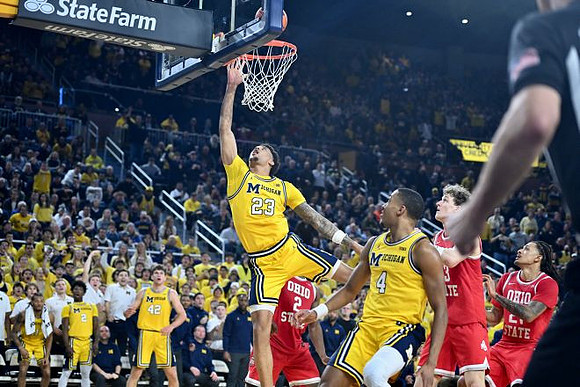 L.J. Cason (2), Will Tschetter (42), Yaxel Lendeborg (23), and Nimari Burnett (4)