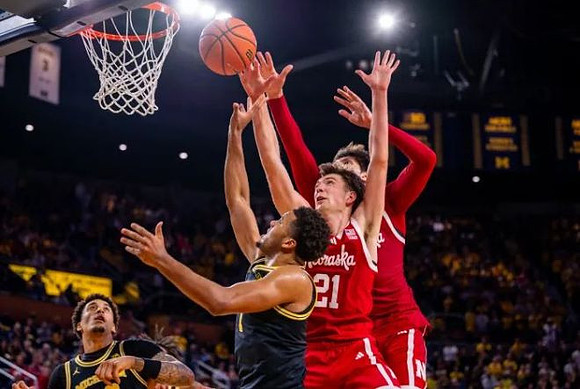Yaxel Lendeborg (23) and Trey McKenney (1)