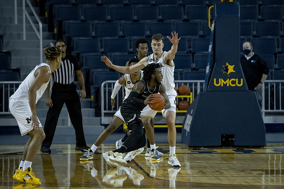 Terrance Williams II (5) and Franz Wagner (21)
