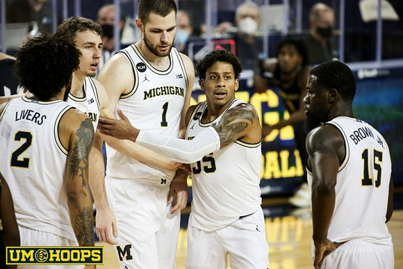 Isaiah Livers (2), Franz Wagner (21), Hunter Dickinson (1), Eli Brooks (55), and Chaundee Brown Jr. (15)