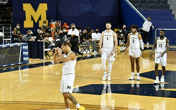 Terrance Williams II (5), Hunter Dickinson (1), Isaiah Livers (2), and Chaundee Brown Jr. (15)