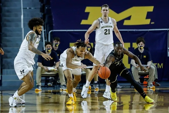 Isaiah Livers (2), Terrance Williams II (5), and Franz Wagner (21)