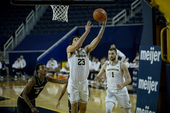 Brandon Johns Jr. (23) and Hunter Dickinson (1)
