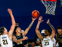 Franz Wagner (21) and Brandon Johns Jr. (23)