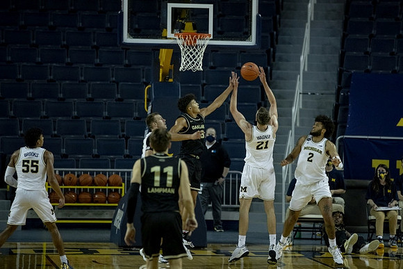 Eli Brooks (55), Austin Davis (51), Franz Wagner (21), and Isaiah Livers (2)