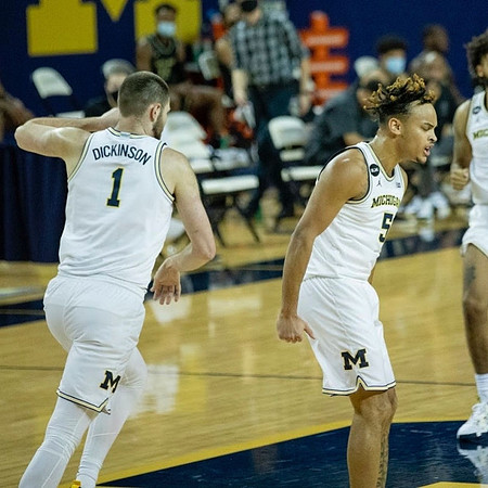 Hunter Dickinson (1) and Terrance Williams II (5)