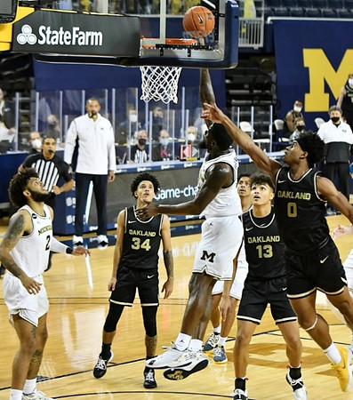 Isaiah Livers (2) and Chaundee Brown Jr. (15)