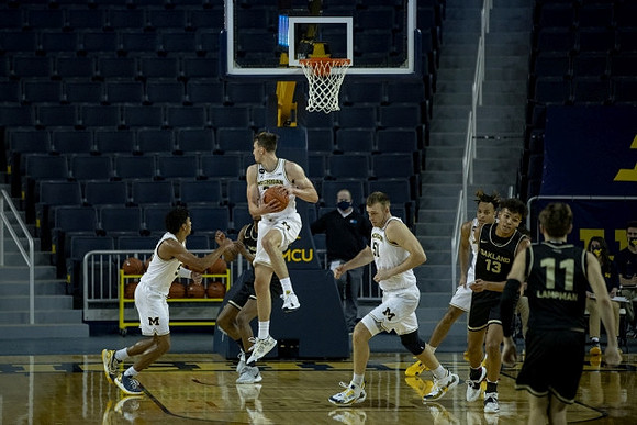 Eli Brooks (55), Franz Wagner (21), Austin Davis (51), and Terrance Williams II (5)