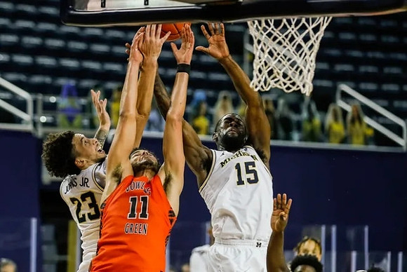 Brandon Johns Jr. (23) and Chaundee Brown Jr. (15)