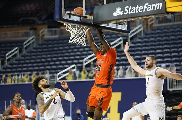 Isaiah Livers (2) and Hunter Dickinson (1)