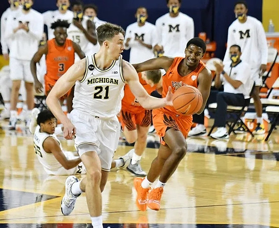 Eli Brooks (55) and Franz Wagner (21)