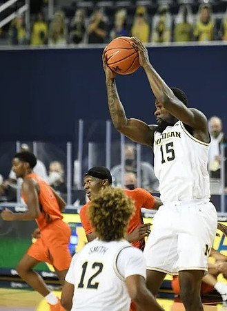 Mike Smith (12) and Chaundee Brown Jr. (15)