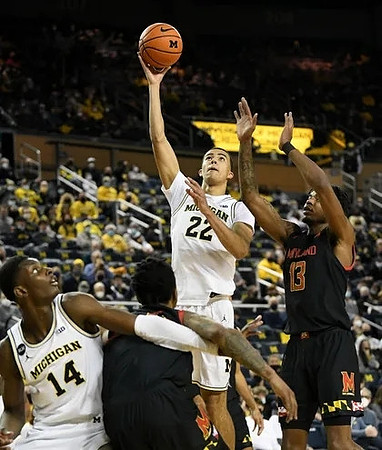 Moussa Diabate (14) and Caleb Houstan (22)