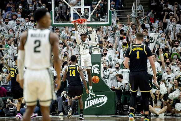 Caleb Houstan (22), Moussa Diabate (14), and Hunter Dickinson (1)