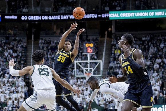 Eli Brooks (55) and Moussa Diabate (14)