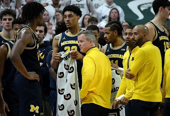 Dusty May and Michigan Team