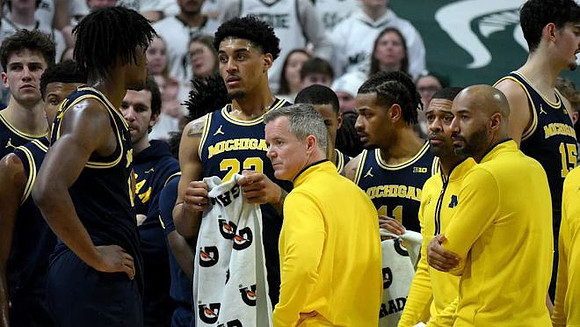 Dusty May and Michigan Team