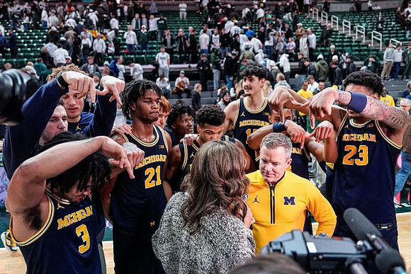 Dusty May and Michigan Team