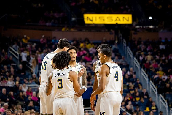 Aday Mara (15), Elliot Cadeau (3), Yaxel Lendeborg (23), Morez Johnson Jr. (21), and Nimari Burnett (4)
