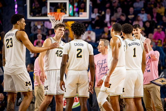 Yaxel Lendeborg (23), Will Tschetter (42), L.J. Cason (2), Dusty May, Nimari Burnett (4), Trey McKenney (1), and Aday Mara (15)