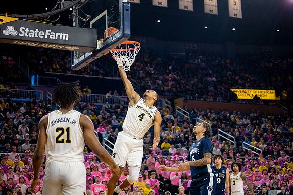 Morez Johnson Jr. (21), Nimari Burnett (4), and Elliot Cadeau (3)