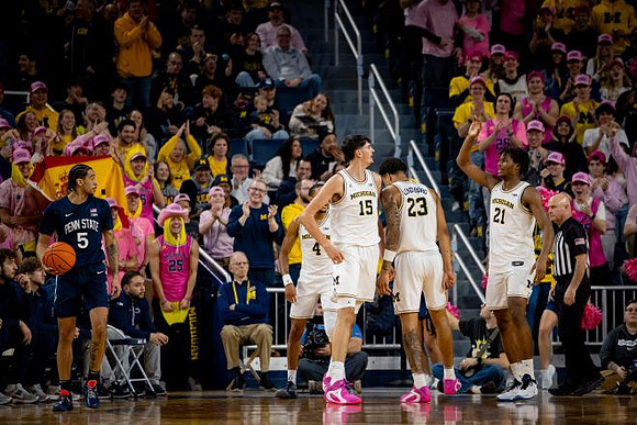 Nimari Burnett (4), Aday Mara (15), Yaxel Lendeborg (23), and Morez Johnson Jr. (21)