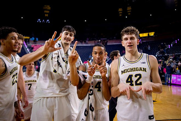 Yaxel Lendeborg (23), Howard Eisley Jr. (7), Aday Mara (15), Nimari Burnett (4), and Will Tschetter (42)