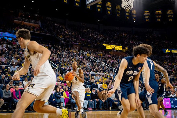 Will Tschetter (42) and Nimari Burnett (4)
