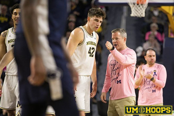 Yaxel Lendeborg (23), Will Tschetter (42), and Dusty May