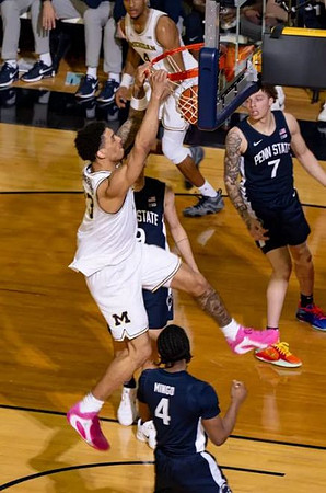Yaxel Lendeborg (23) and Nimari Burnett (4)