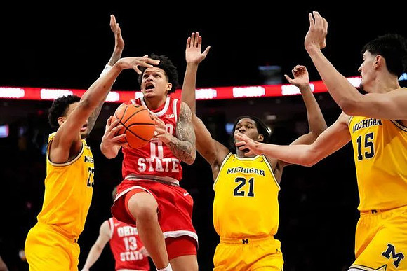 Yaxel Lendeborg (23), Morez Johnson Jr. (21), and Aday Mara (15)