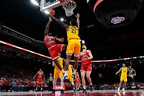 Elliot Cadeau (3), Nimari Burnett (4), Morez Johnson Jr. (21), and Yaxel Lendeborg (23)