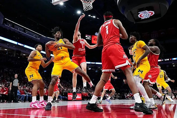 Trey McKenney (1), Morez Johnson Jr. (21), L.J. Cason (2), and Yaxel Lendeborg (23)