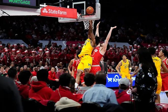 Morez Johnson Jr. (21), Yaxel Lendeborg (23), and Trey McKenney (1)