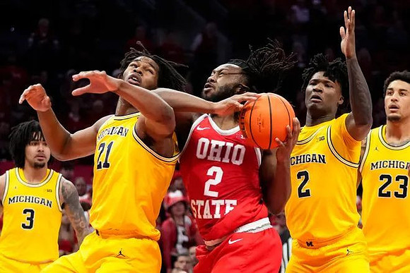 Elliot Cadeau (3), Morez Johnson Jr. (21), L.J. Cason (2), and Yaxel Lendeborg (23)
