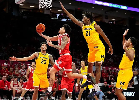 Yaxel Lendeborg (23), Nimari Burnett (4), Morez Johnson Jr. (21), and Trey McKenney (1)