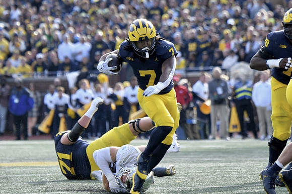 Evan Link (71), Donovan Edwards (7), and Myles Hinton (78)
