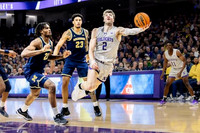 Morez Johnson Jr. (21) and Yaxel Lendeborg (23)