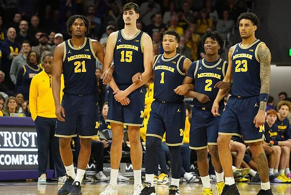 Morez Johnson Jr. (21), Aday Mara (15), Trey McKenney (1), L.J. Cason (2), and Yaxel Lendeborg (23)