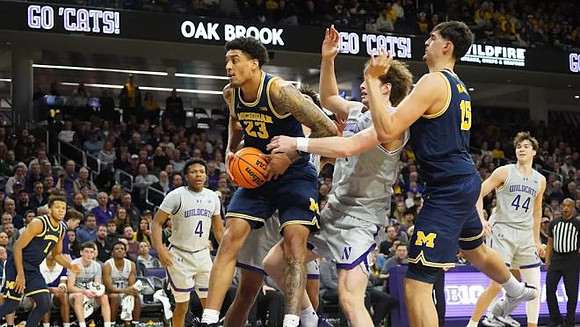 Trey McKenney (1), Yaxel Lendeborg (23), and Aday Mara (15)