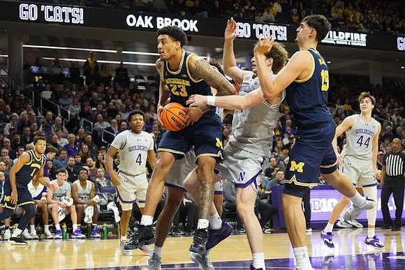 Trey McKenney (1), Yaxel Lendeborg (23), and Aday Mara (15)
