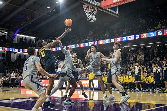 Morez Johnson Jr. (21), Yaxel Lendeborg (23), and Roddy Gayle Jr. (11)